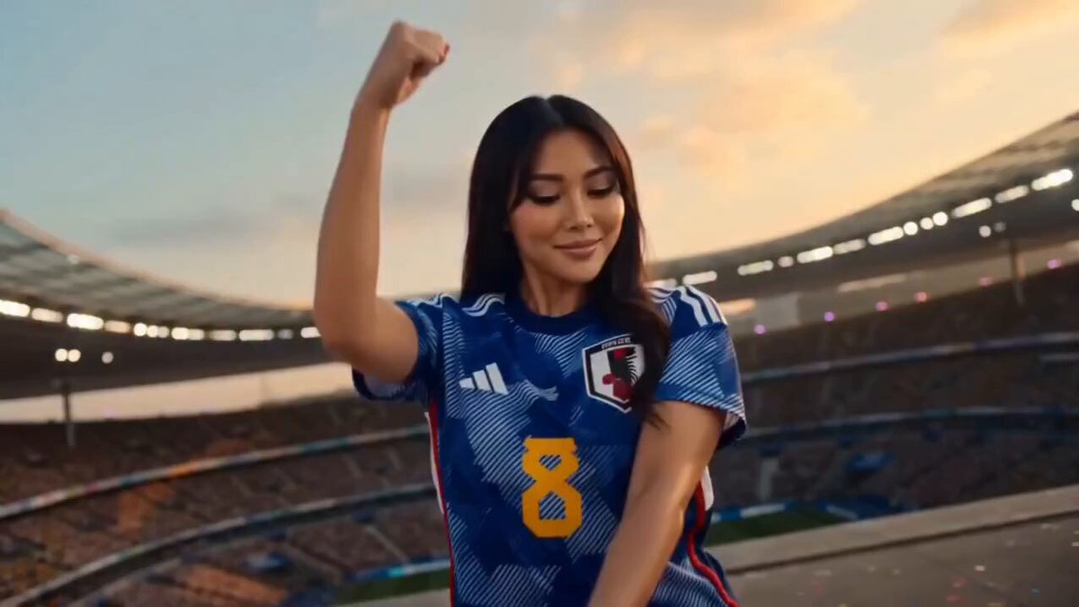Football Fans Celebrating in Stadium
